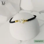 دستبند نخی با پلاک طلا کد001